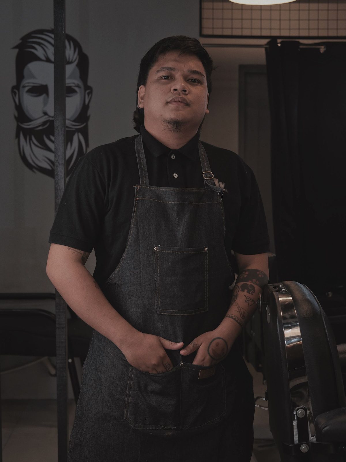 Porträt von Kadir, Master Barber / Inhaber